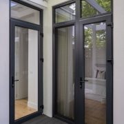 UPVC residential door with clear glass and outdoor access