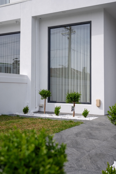 Corner window with sleek frame and outdoor view