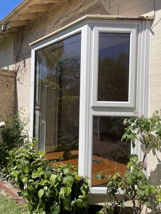 Fixed corner window offering wide outdoor view