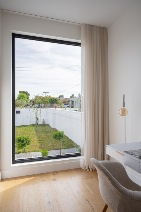 Interior view of a large fixed window in a living room