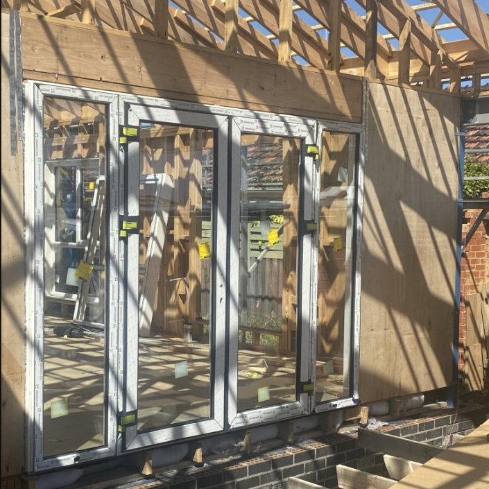 UPVC window installation at Project Bentleigh during construction phase.