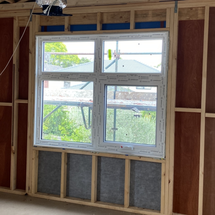 New window installation at Project Camberwell, shown in the early stages of construction.