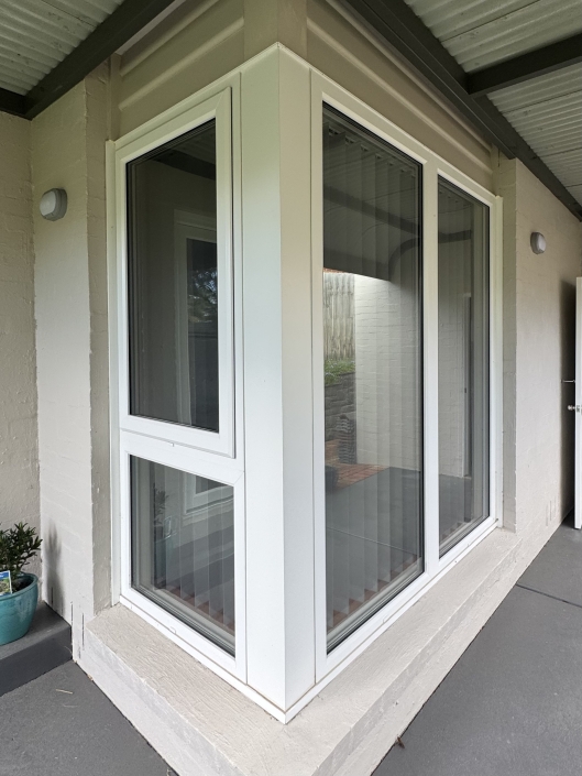 UPVC bay window with a mesh screen