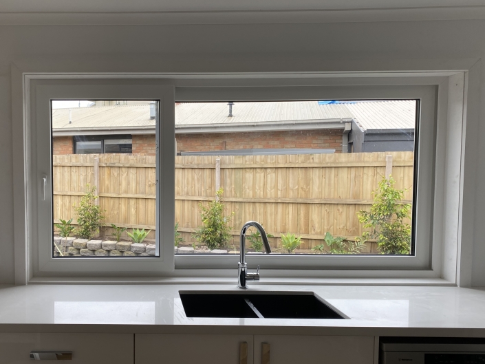 UPVC window with kitchen sink and view outside