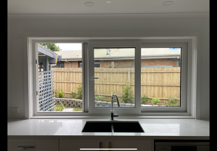 Modern interior with UPVC window and outside view