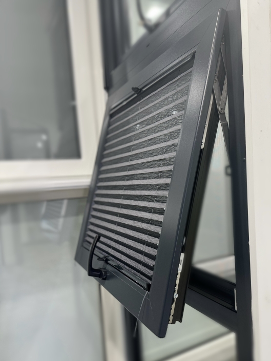 UPVC window with slatted blind UPVC window with slatted blind installed